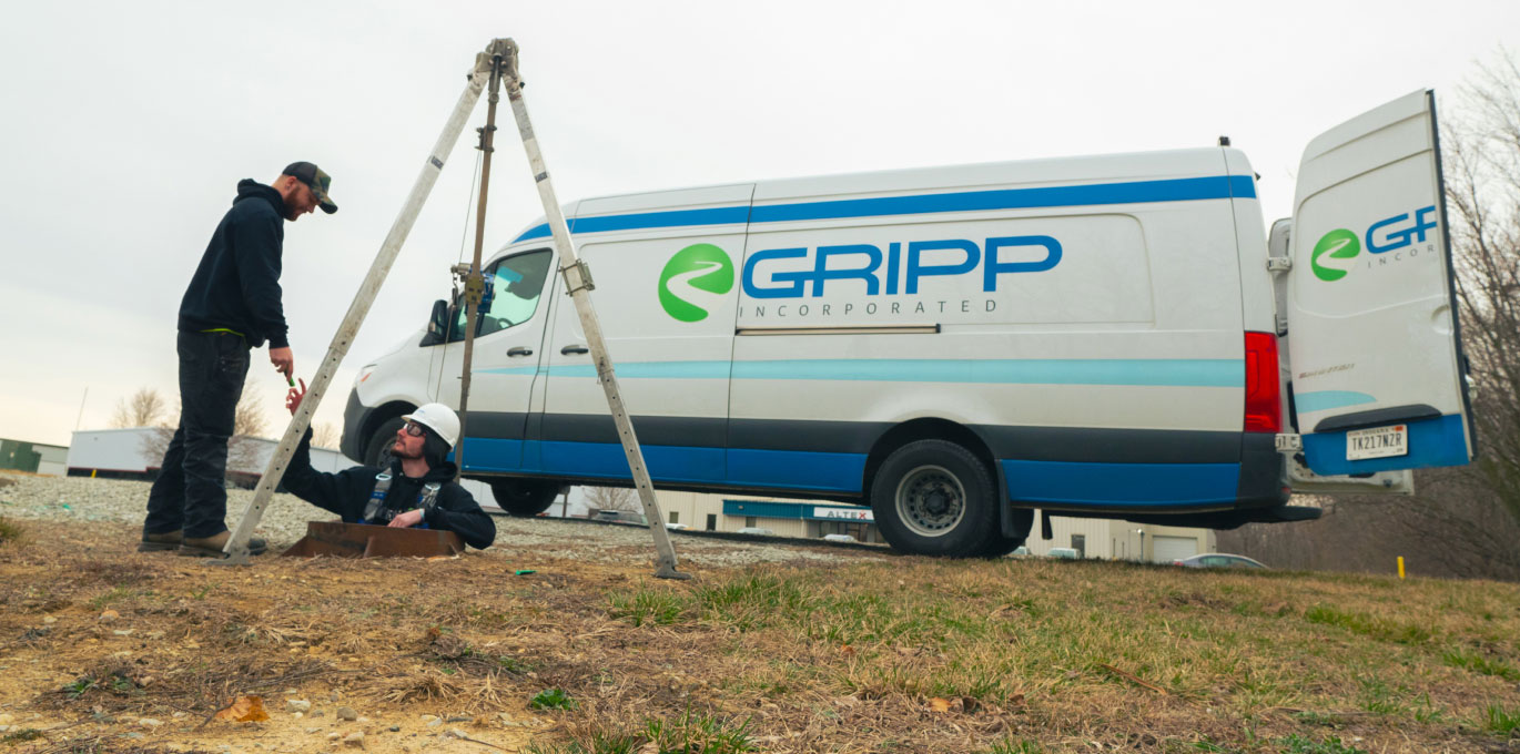 Gripp employee in manhole